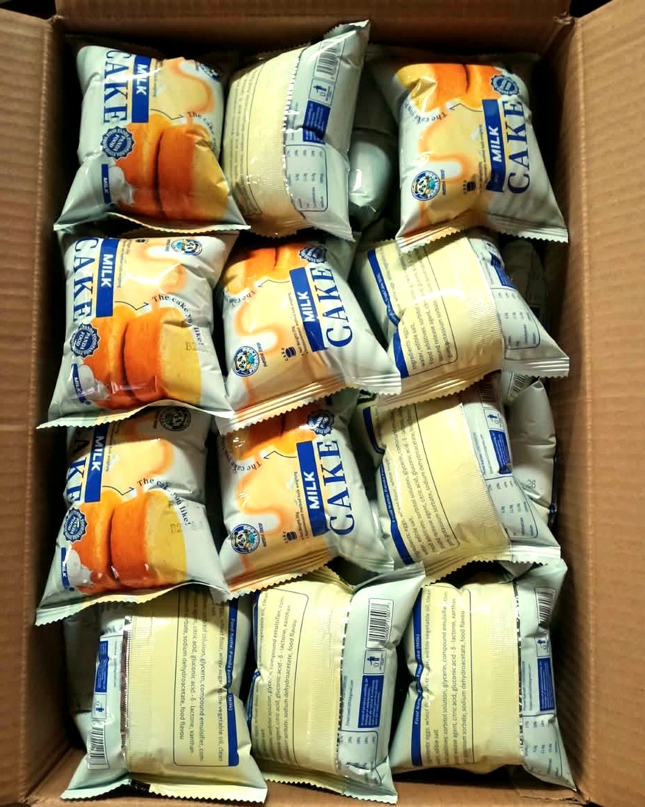 Open carton of packed Olemo Panda Milk Cakes